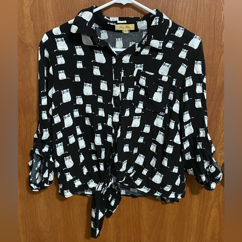 Cute, cat w/ glasses, button-down blouse.